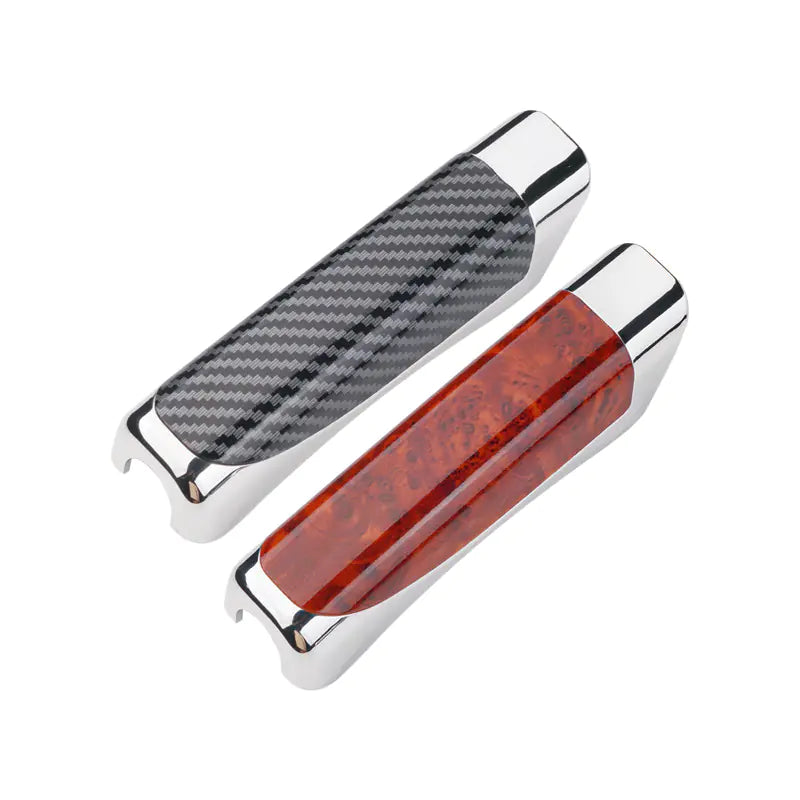 Two knife handles, one with a carbon fiber pattern and the other with a red tortoiseshell pattern, on a white background.