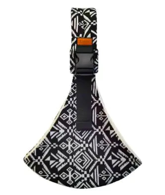 Black and white patterned dog muzzle with a black strap on a white background