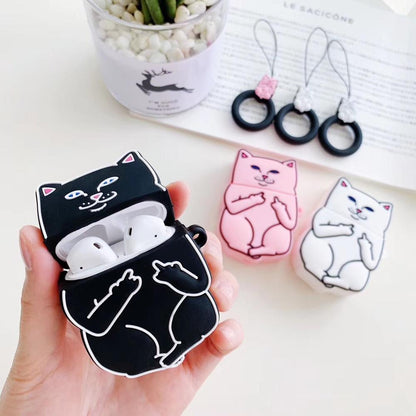 Black airpod case with cat designs held by a hand, with pink and white cat cases in the background.
