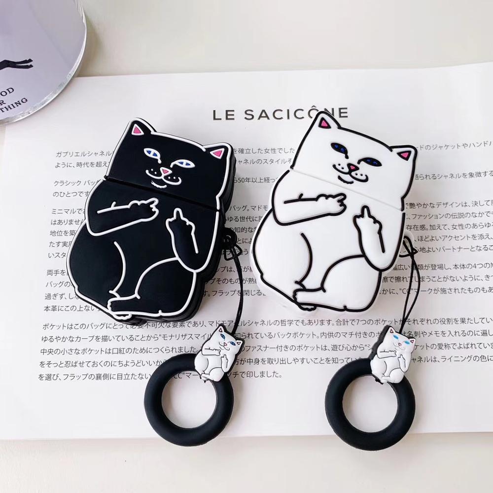 Two cat-shaped phone cases on a magazine with visible text.