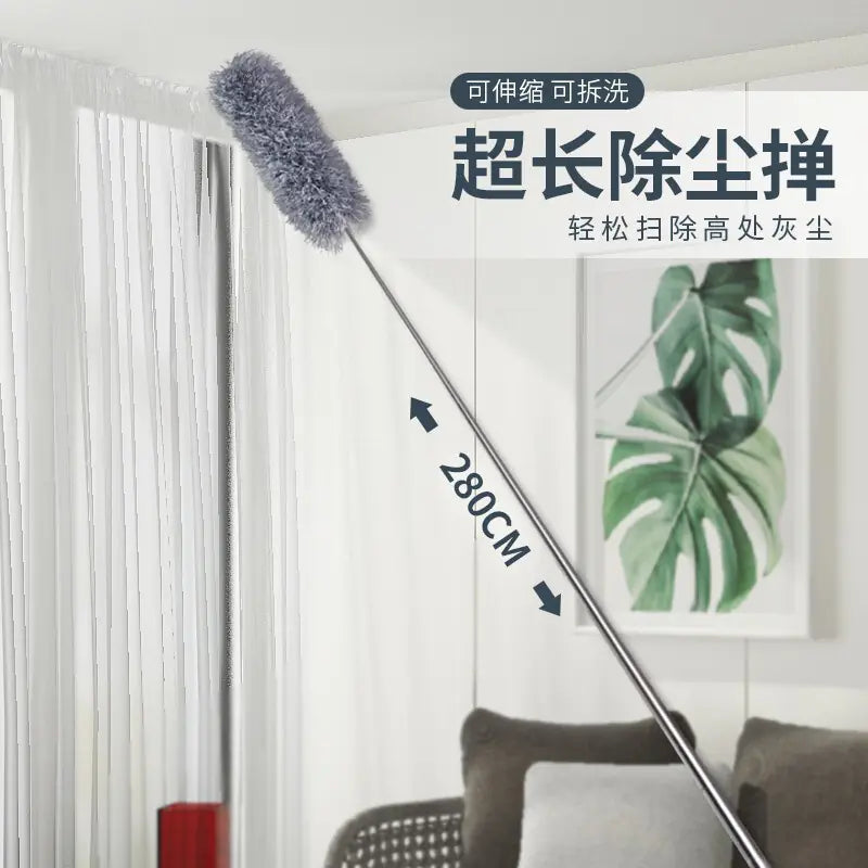 Long-handled duster with extendable feature in a room setting
