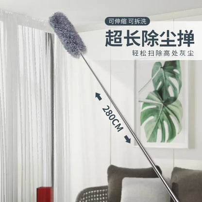 Long-handled duster with extendable feature in a room setting