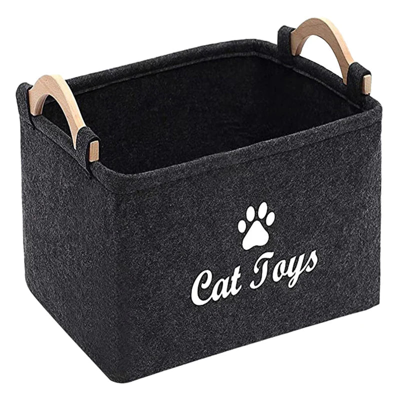 Black storage bin with 'Cat Toys' text and paw print logo on a white background