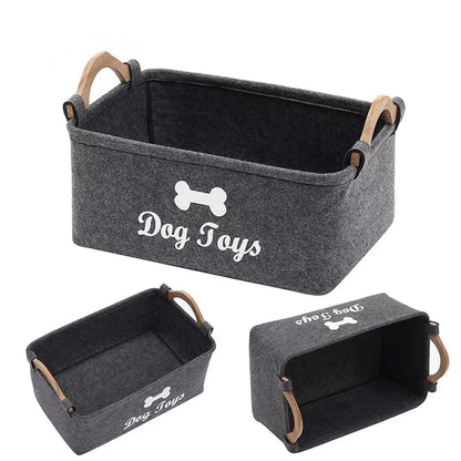 Set of three gray pet toy storage bins with 'Dog Toys' and bone designs on a white background