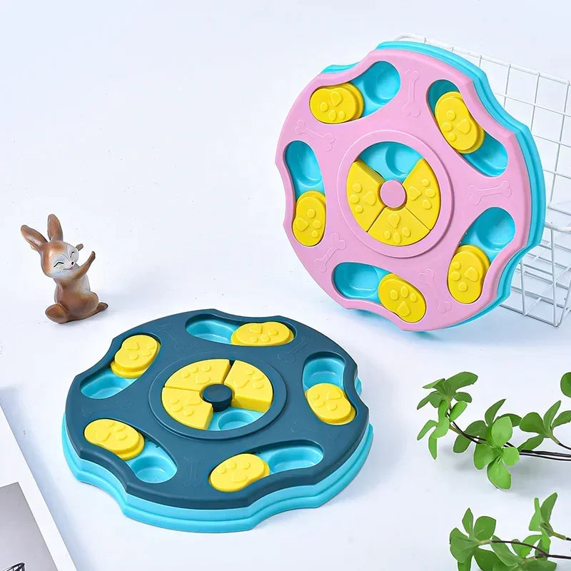 Two colorful dog toys with yellow centers on a white surface.