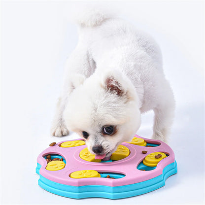 Dog interacting with a colorful puzzle toy on a white background