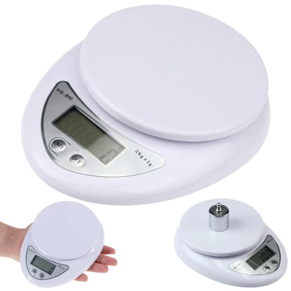 White digital kitchen scale with a hand holding one of its smaller versions.