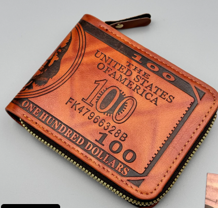 Brown wallet designed to resemble a $100 bill on a gray background