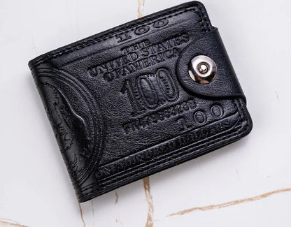 Black leather wallet with embossed text on a light marble background