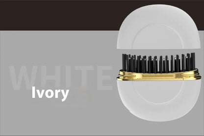 Hairbrush with black bristles and gold accents on a gray background, labeled 'Ivory'.