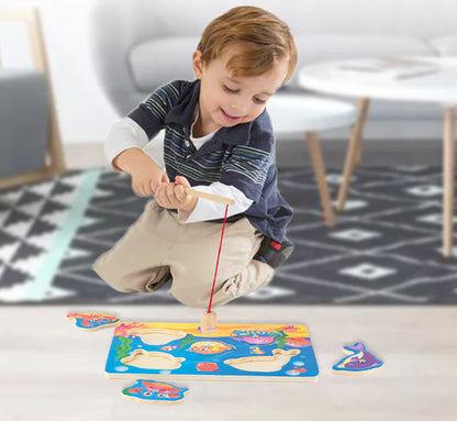 Child playing with a colorful magnetic fishing game on a carpeted floor.